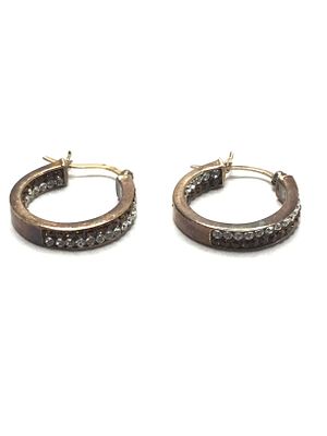 Sterling silver earrings. Sterling earrings with clear and red garnet gemstones. 4.40 grams 