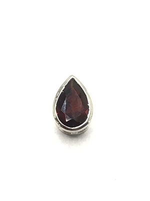 Sterling silver pendant. Sterling pendant with red garnet gemstone. 1.24 grams total weight.
