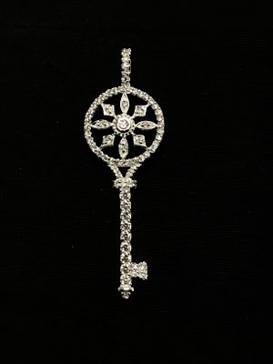 Sterling silver pendant. Sterling pendant with multiple clear gemstones. 3.71 grams total weight.