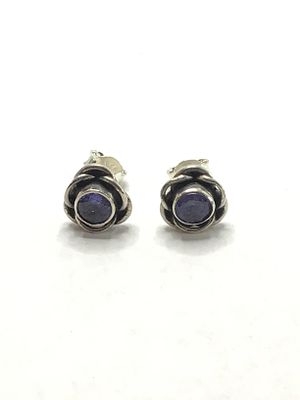 Sterling silver earrings. Sterling earrings with purple gemstones. 2.62 grams total weight.