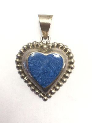 Artisan handmade pendant. Sterling silver pendant with blue colored stone.16.85 grams total 