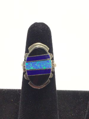 Navajo handmade ring. Sterling silver ring with jet, lapis and opal inlay. 5.42 grams total 