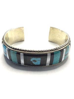 Zuni handmade cuff bracelet. Sterling silver cuff with multiple stone inlay. 57.90 grams total 