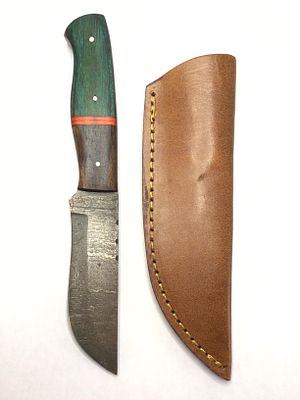 Damascus skinning knife with sheath. Full Tang. 4 inch blade length.