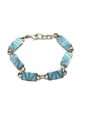 Zuni handmade bracelet. Sterling silver bracelet featuring turquoise inlay. 13.14 grams of total 