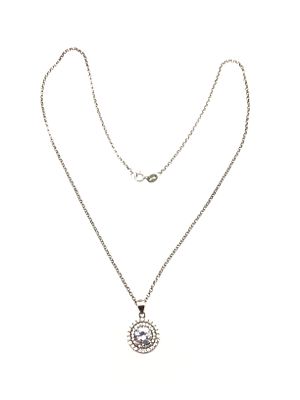 Sterling silver necklace with pendant. Sterling necklace with pendant featuring round cut CZ 
