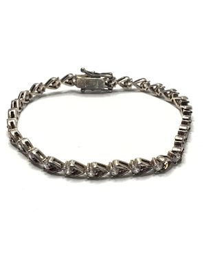 Sterling silver bracelet. Sterling bracelet with multiple 0.10 carat gemstones. 11.83 grams 