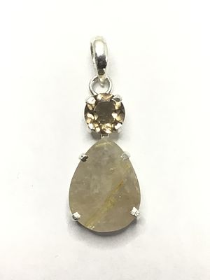 Sterling silver pendant. Sterling pendant with citrine and quartz gemstones. 3.64 grams total weight.