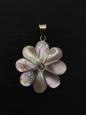 Sterling silver pendant. Sterling pendant with mother of pearl inlay. 7.44 grams total weight.