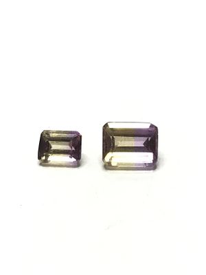 Ametrine gemstones. Emerald cut ametrines. 5.45 carats total.