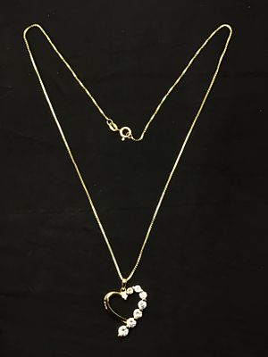 Sterling silver necklace and pendant. Sterling necklace with pendant featuring multiple CZ 