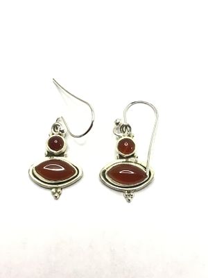 Sterling silver earrings. Sterling earrings with red garnet gemstones. 4.17 grams total weight.