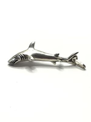 Artisan made pendant. Sterling silver shark pendant weighing 13.95 grams total. Made in Mexico.
