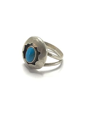 Artisan handmade ring. Sterling silver ring with turquoise stone. 5.93 grams total weight. Size 