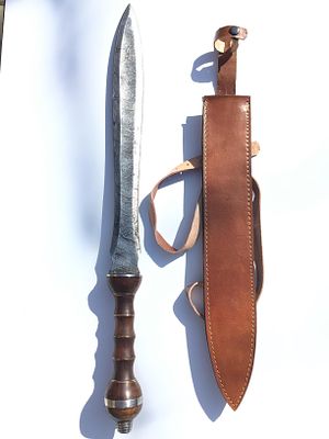 Damascus bladed sword. Sword with Damascus blade with sheath and baldric. 18 inch blade length.