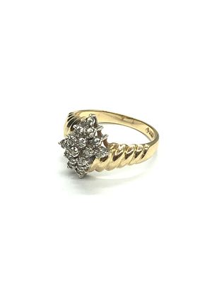 10k gold ring. 10k yellow gold ring with multiple diamonds. 3.37 grams total weight. Size 6 1/2.