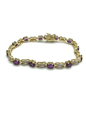 Sterling silver bracelet. Sterling bracelet with amethyst gemstones. 10.83 grams total weight. 7 