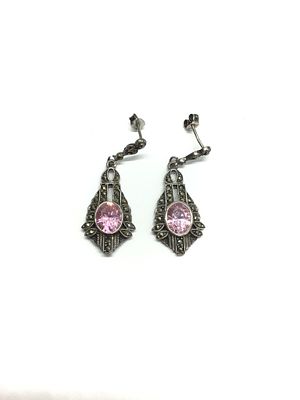 Sterling silver earrings. Sterling earrings with pink gemstones. 8.48 grams total weight.