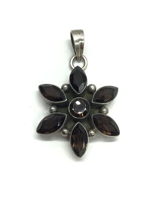 Sterling silver pendant. Sterling pendant with smoky quartz gemstones. 6.75 grams total weight.