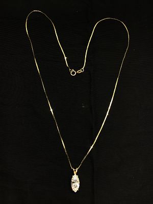 14k gold necklace and pendant. 14K yellow gold necklace with CZ pendant. 1.94 grams of total 