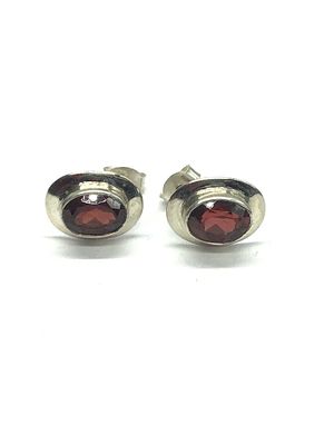 Sterling silver earrings. Sterling earrings with red garnet gemstones. 2.71 grams total weight.