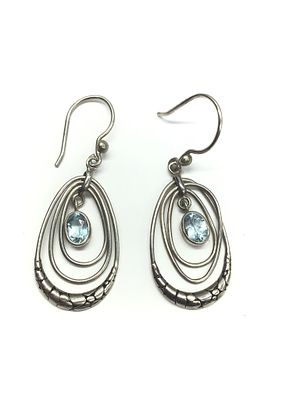 Sterling silver earrings. Sterling earrings with blue topaz gemstones. 6.31 grams total weight.