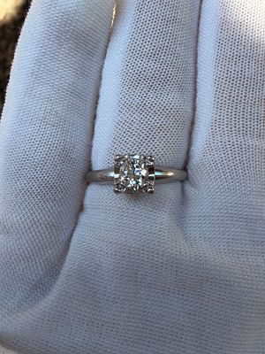 Platinum Diamond Solitaire Ring. Crafted in platinum, this elegant solitaire ring features a 