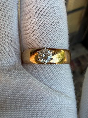 14K Gold Diamond Statement Ring. Bold yet timeless, this 14K gold ring features a sparkling .35 