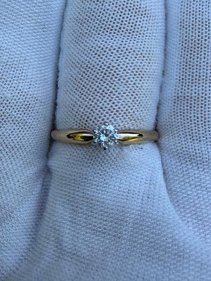 .15ct 14k Solitaire Ring. Crafted in classic 14K yellow gold, this elegant solitaire ring 
