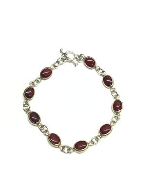Artisan made bracelet. Sterling silver bracelet with reddish stones. 4.27 grams total weight. 7 
