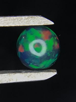 Opal cabachon. 7.9x7.9mm opal cabachon. 1.15 carats total.