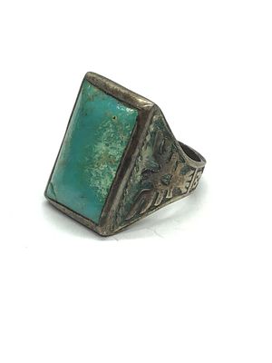 Sterling silver ring. Sterling ring with turquoise stone. 10.33 grams total weight. Size 9. Sold 