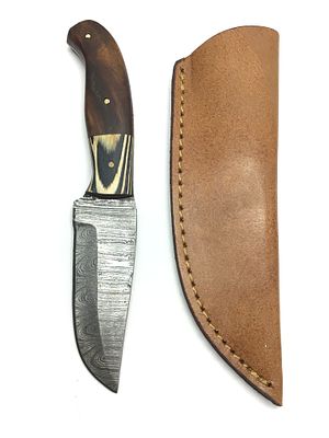 Damascus skinning knife with sheath. Full Tang. 3 1/2 inch blade length.