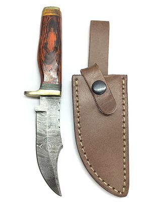 Damascus skinning knife with sheath. 4 inch blade length.