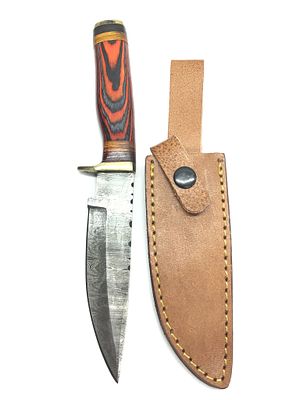 Damascus skinning knife with sheath. 5 1/4 inch blade length.