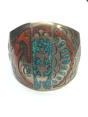 Navajo handmade cuff bracelet. Vintage sterling silver cuff with turquoise and coral chip inlay. 