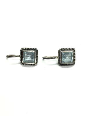 Sterling silver earrings. Sterling earrings with blue topaz gemstones. 3.49 grams total weight.