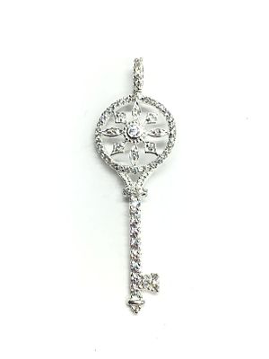 Sterling silver pendant. Sterling pendant with clear gemstones. 3.67 grams total weight.