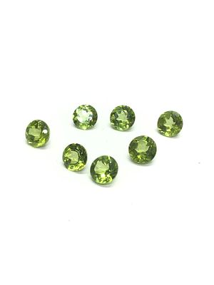 Peridot gemstones. Round cut peridots. 10.55 carats total.