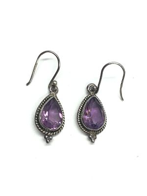 Sterling silver earrings. Sterling earrings with amethyst gemstones. 3.91 grams total weight.