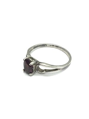 Sterling silver ring. Sterling ring with red garnet gemstone. 1.88 grams total weight. Size 8 1/2.