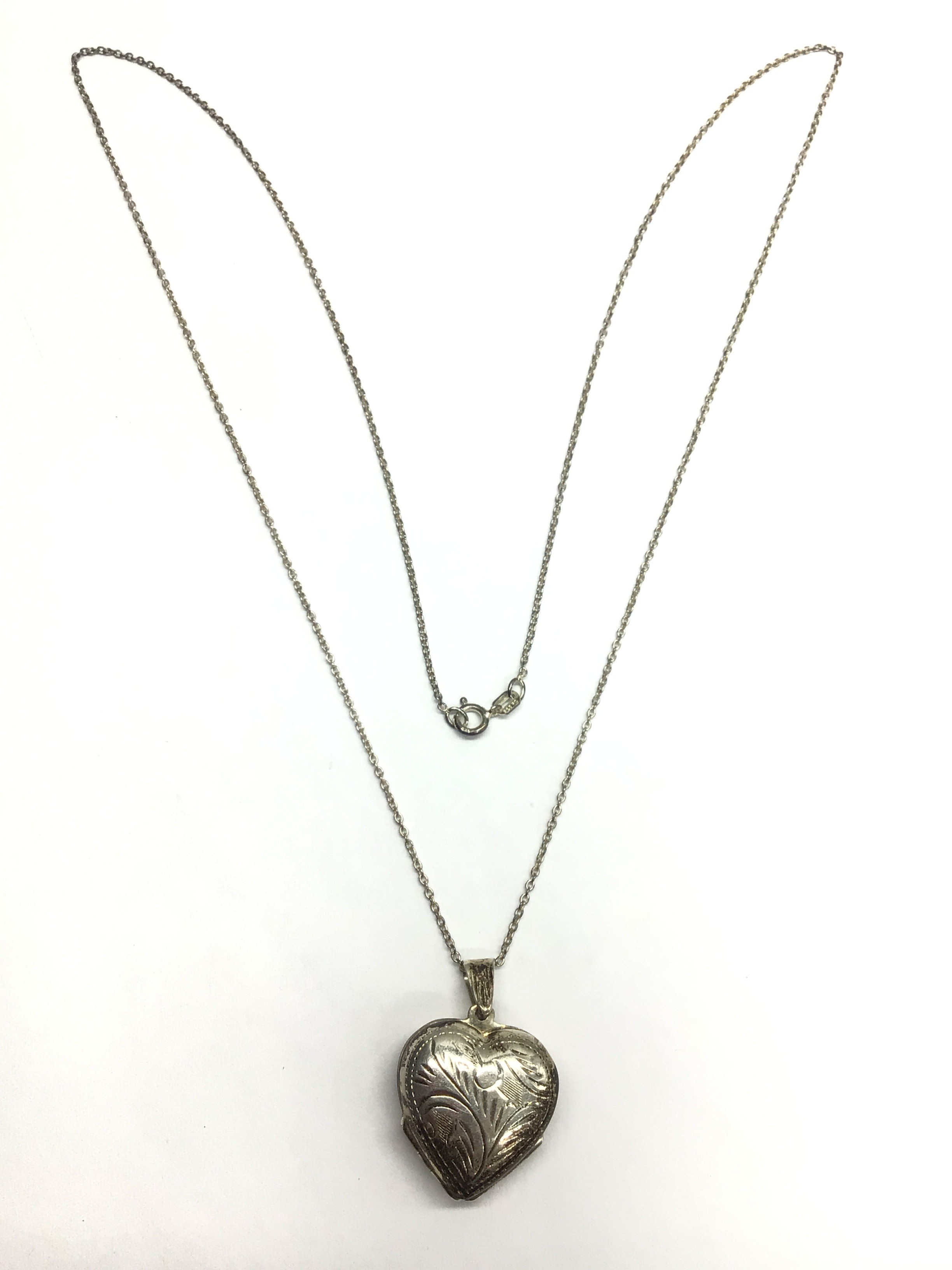 Sterling silver necklace with pendant.