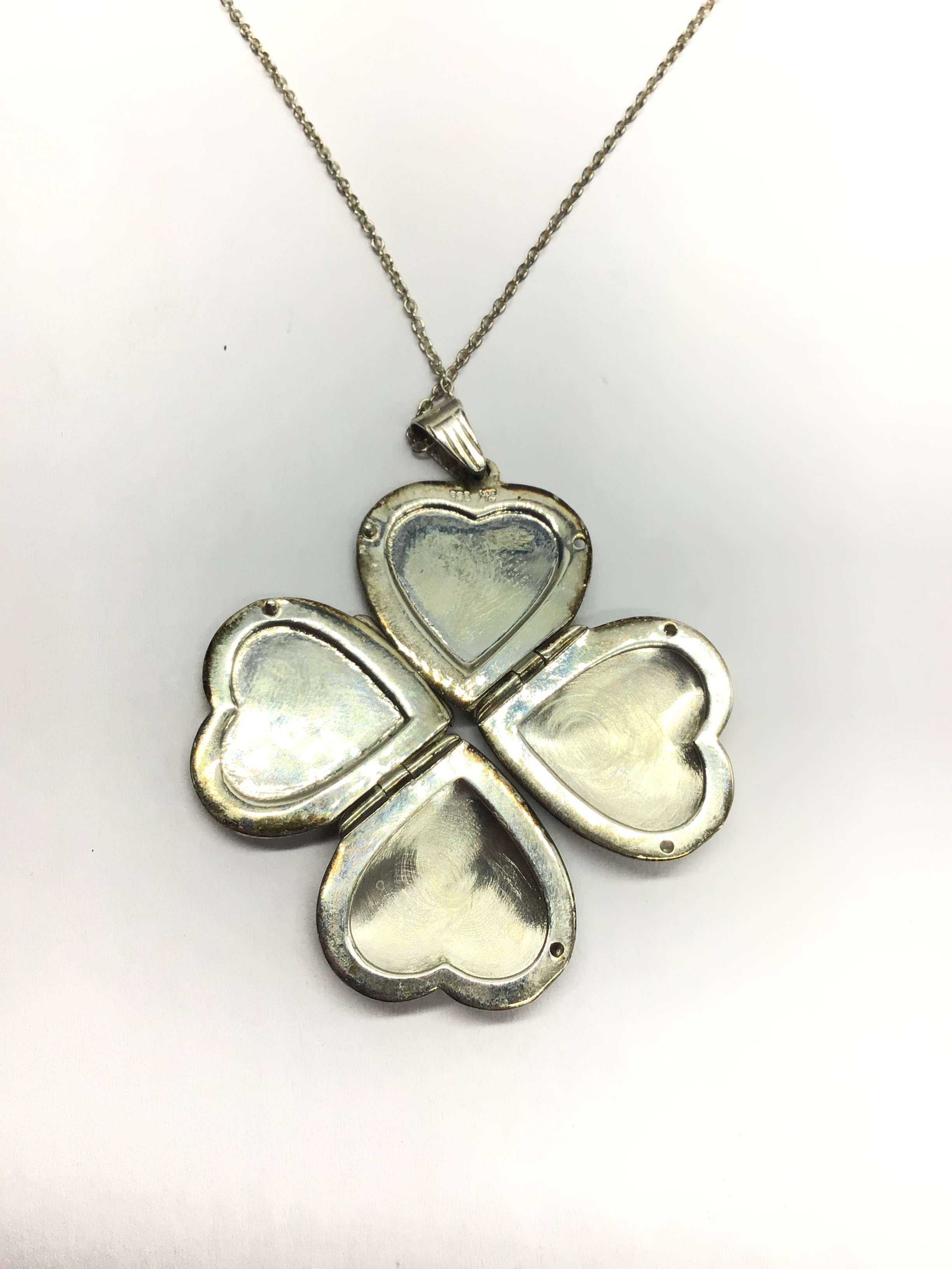 Sterling silver necklace with pendant.
