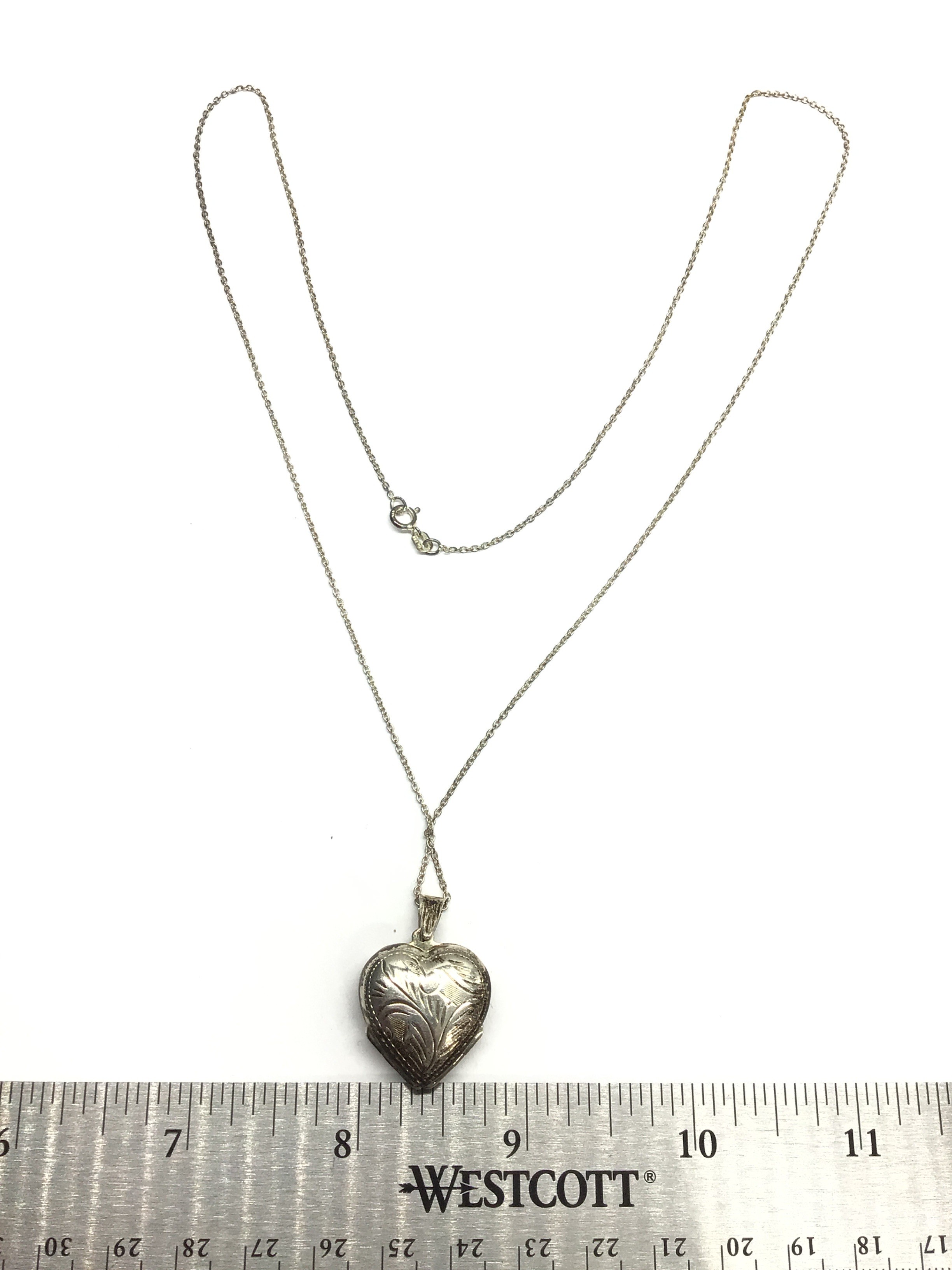 Sterling silver necklace with pendant.