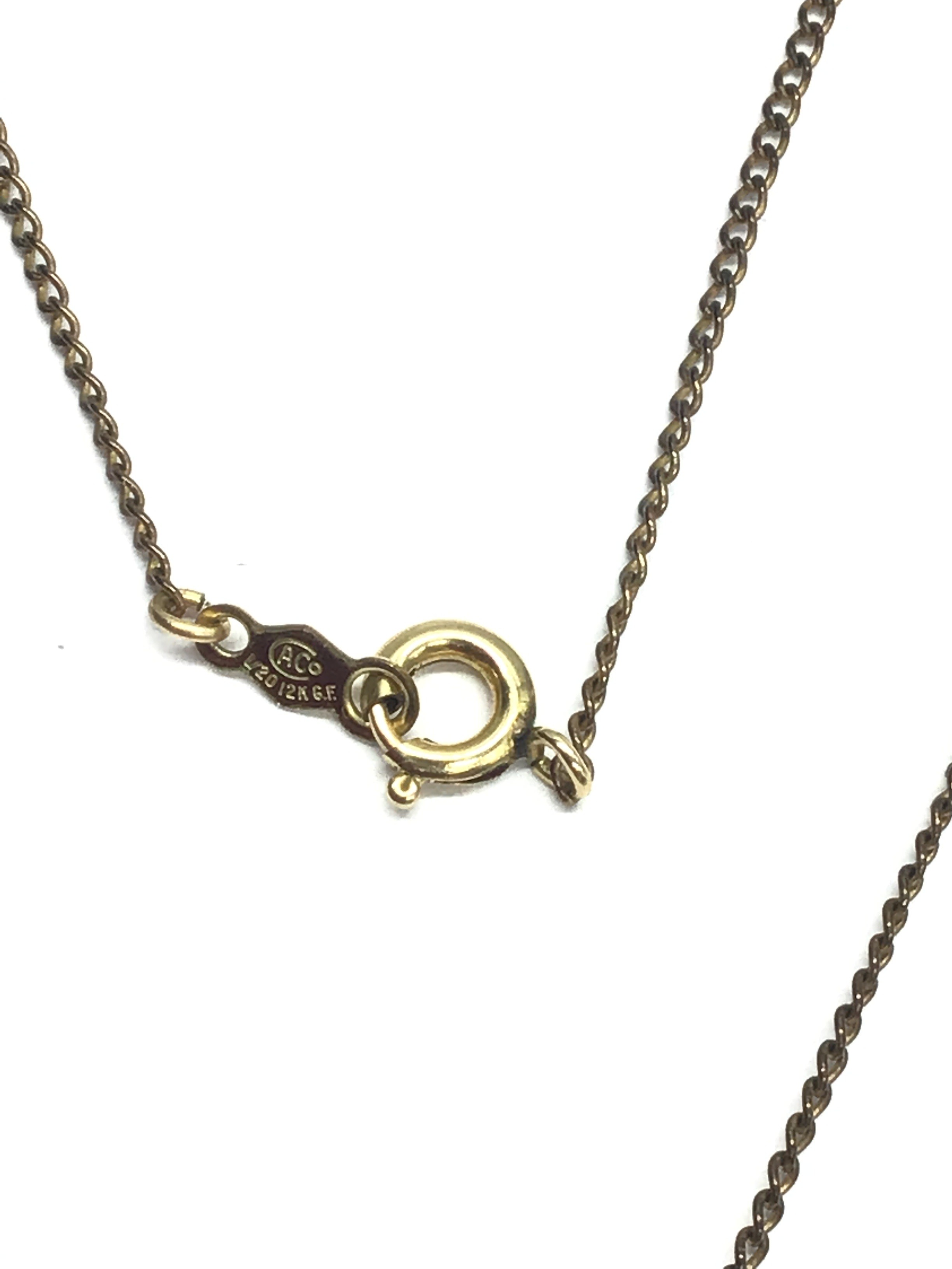 Gold necklace with pendant
