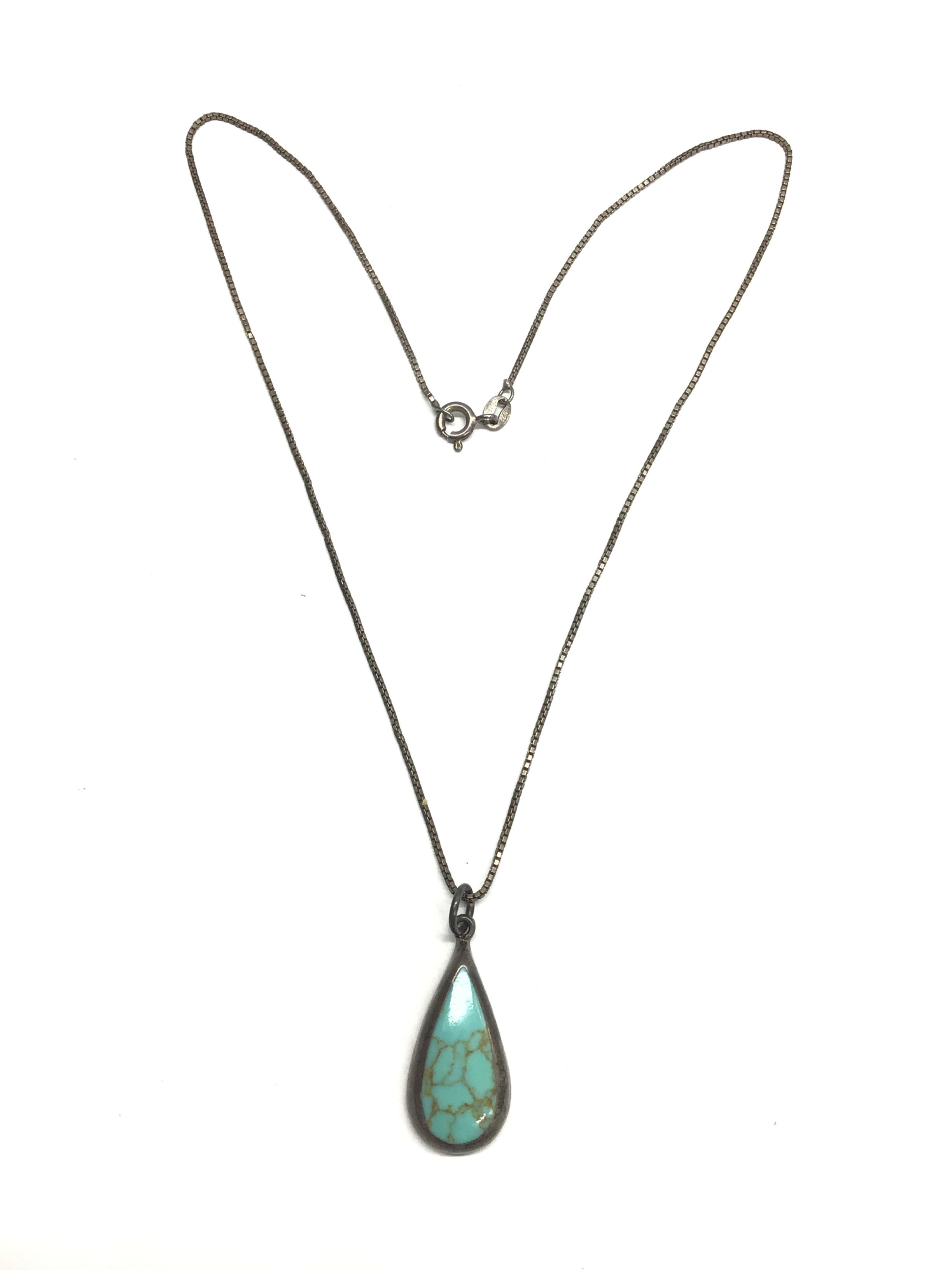 Sterling silver necklace with artisan made pendant