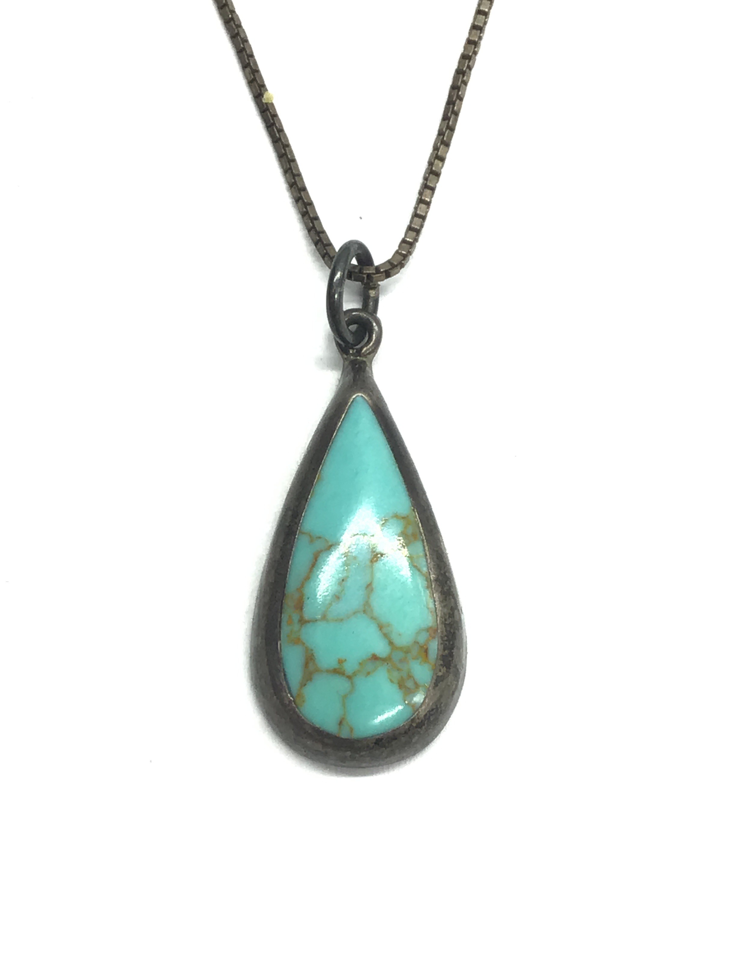 Sterling silver necklace with artisan made pendant