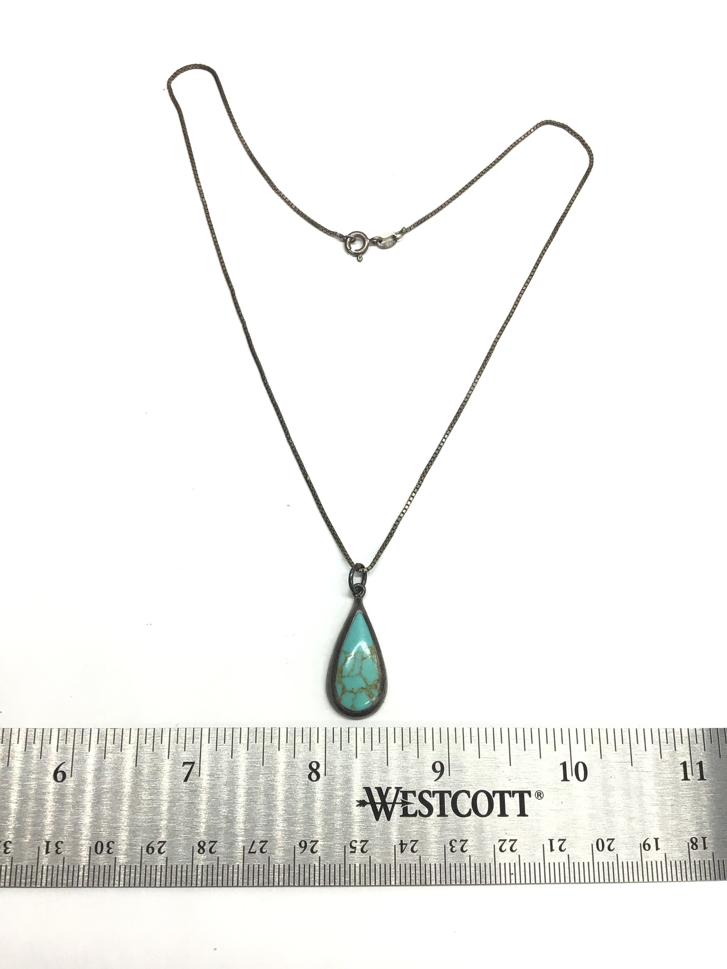 Sterling silver necklace with artisan made pendant