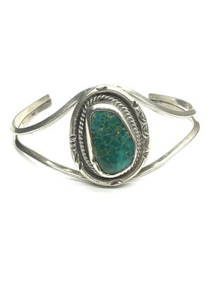 Navajo turquoise cuff bracelet. Sterling silver cuff with turquoise stone. 15.31 grams total weight.