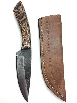 Steel bladed knife with sheath. 3.75 inch blade length.